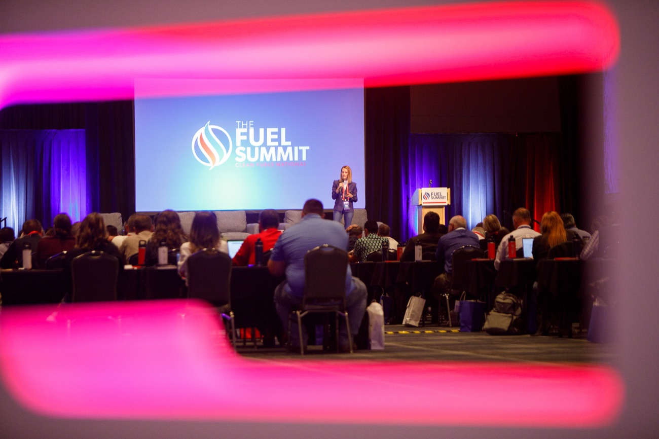Angie Carel on stage under event lighting
