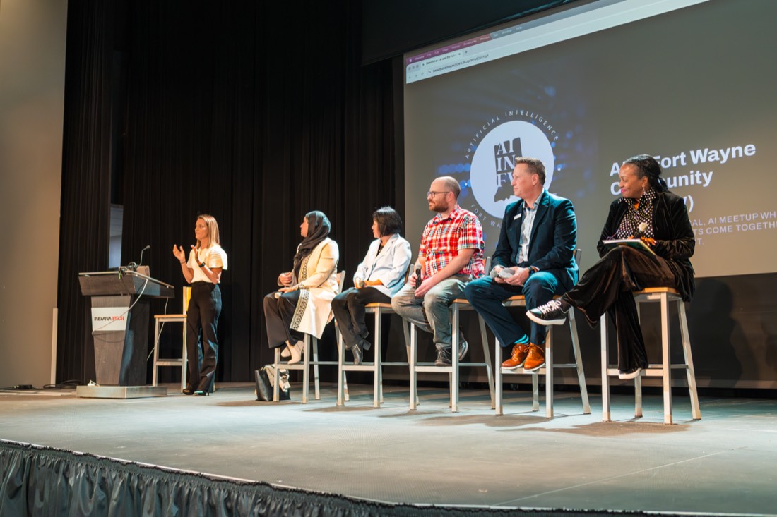 Angie Carel moderating an AI community panel